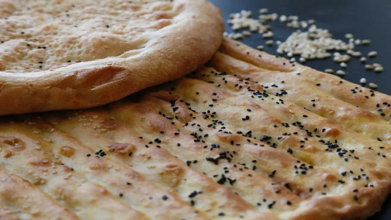 Clash Of The Naans: How Did This Flatbread Land On The Indian Plate? 