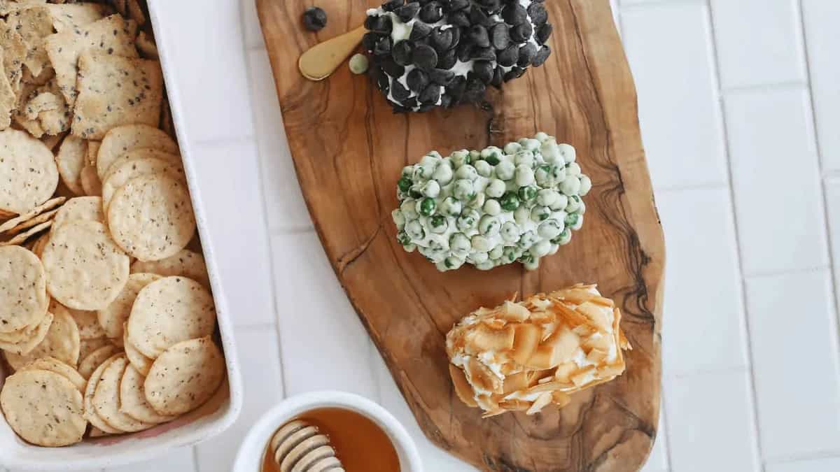4 Cheese Log Recipes To Upgrade Your Summer Charcuterie Board