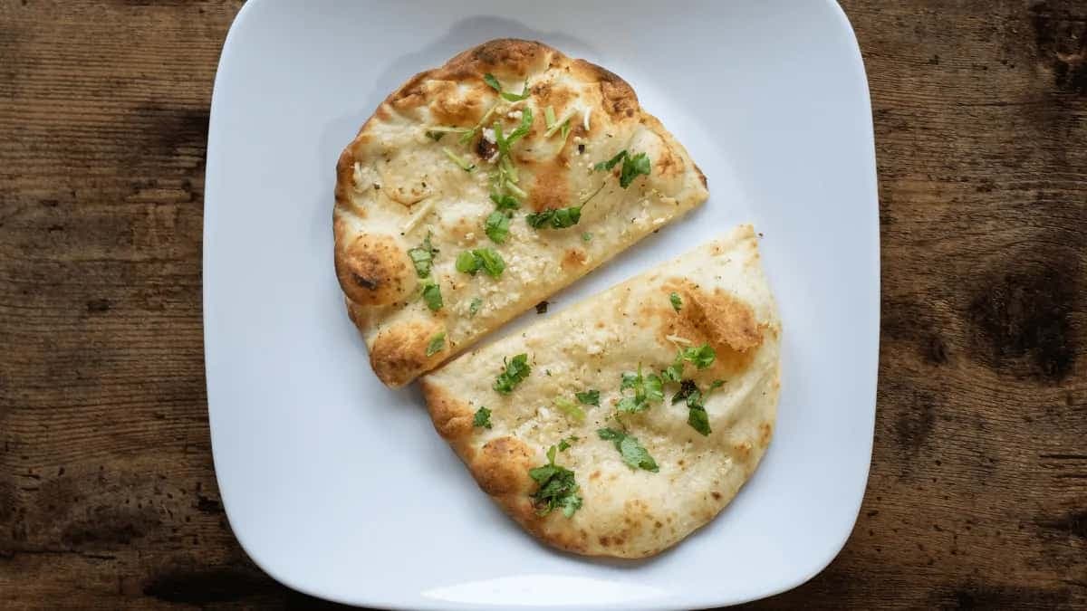 20 Dishes To Try In 2024 - Butter Garlic Naan Takes 7th Position